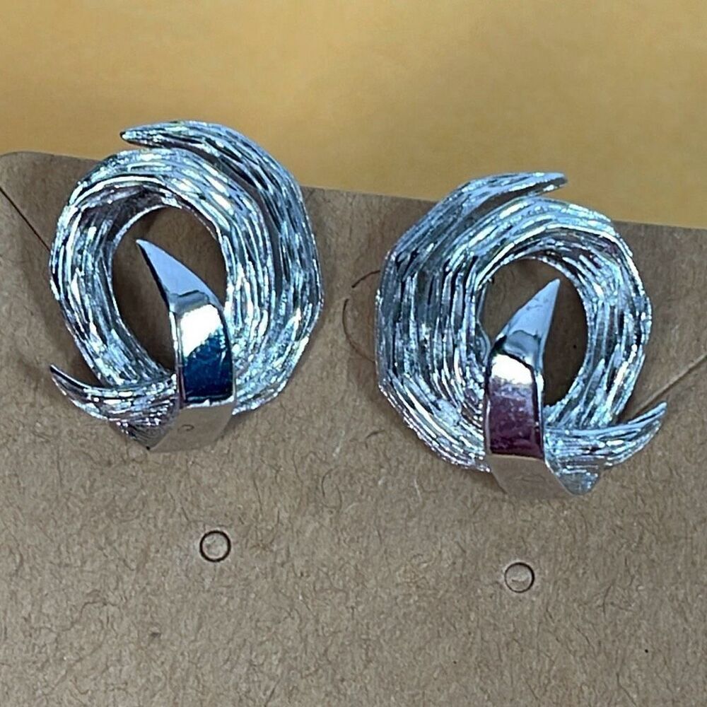 Vintage Trifari silver colored clip earrings